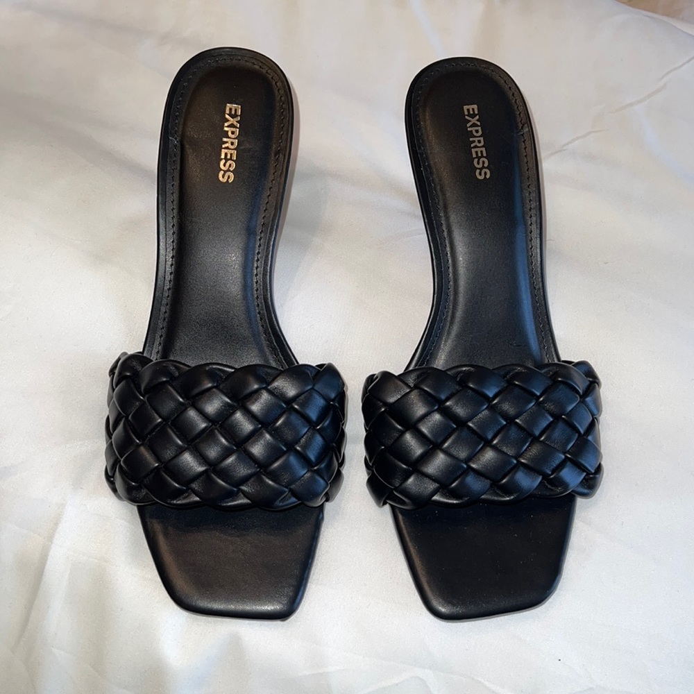Express black braided open-toed Like new. Scuffs on bottom. Heel height is 2”.